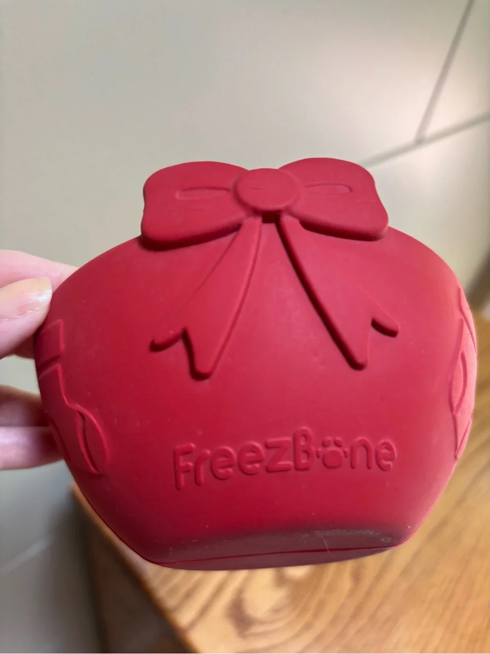 FreezBone dog enrichment toy red bow holiday limited edition